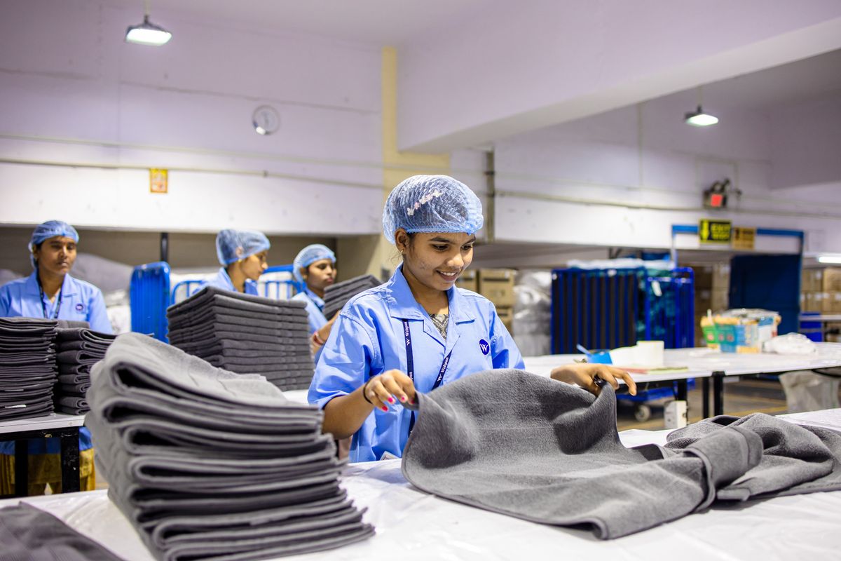 Staff at a modern textile production facility